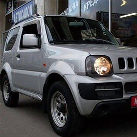 Дефлектори вікон вітровики Сузукі Джимни (ДжБ43) Suzuki Jimny (JB43) 98-  КТ (Накладні)