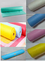 Одноразові простирадла та чохли на кушетку