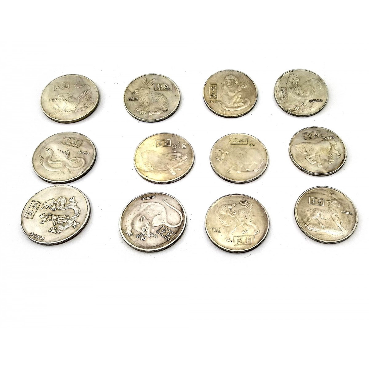 Монеты коллекционные "Гороскоп" d-3,8см набор 12шт (23269) - фото 1 - id-p187916969