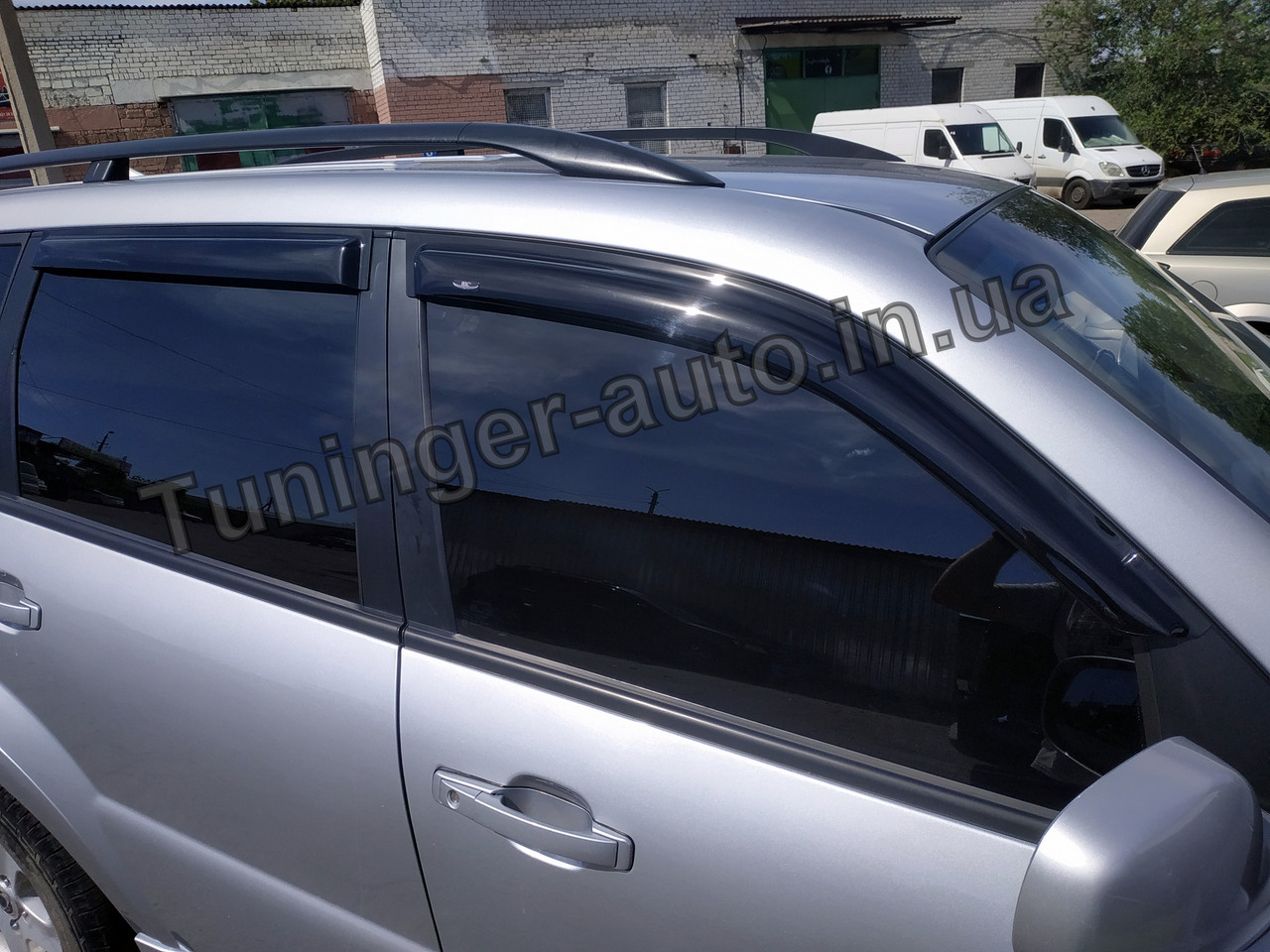 Дефлектори вікон (вітровики) Ssangyong Rexton 2007-2012 (Hic)