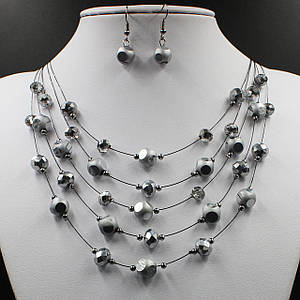 Комплект намистини та сережки жіночі довгі сріблястого кольору матові намистинки довжина 60х3х1 см