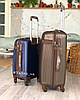 Середній пластиковий чемодан синій на 4-х колесах, фото 4