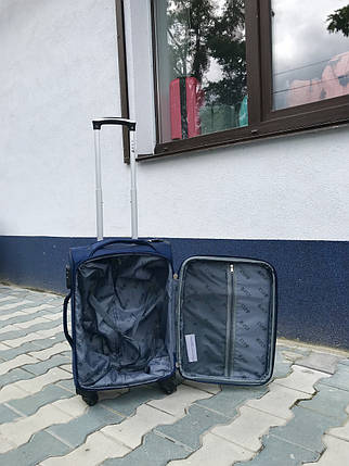 Якісний текстильний валізу маленький синій для ручної поклажі на 4-х колесах 360* Польща, фото 2