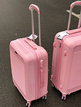 Великий пластиковий чемодан рожевий Польща, фото 3