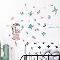 Вінілові наклейки на стіну, вікна, шафи, вітрин "Дівчинка запускає метеликів" 103см*148см (лист 50*70см), фото 2