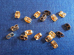 Заглушка для сережок метал золото паковання 95 грамів