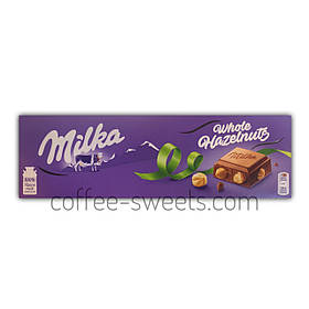 Шоколад Milka 250 г молочний Whole Hazelnuts