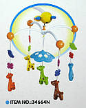 Мобіль (карусель) на ліжечко, пульт ДУ, пластикові іграшки жирафи, фото 4