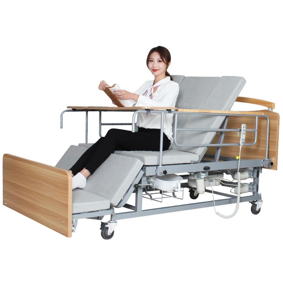Медичне електроліжко з туалетом і боковим переворотом MIRID Е04. Функціональне ліжко для інваліда. Ліжко для реабілітації.