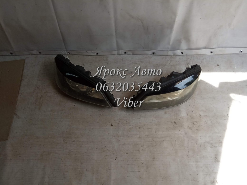 Фара vw passat b5 01-05 ліва відламано одне кріплення 000020317, фото 1