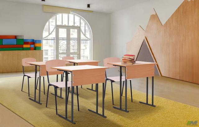 Парты одноместные Аудиторные в интерьере школы.