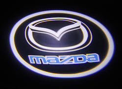 Проекція логотипу автомобіля MAZDA