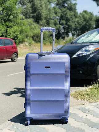 Середній пластиковий чемодан з полікарбонату бузковий, фото 2