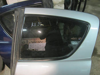 Скло заднього лівого дверей Mazda RX-8
