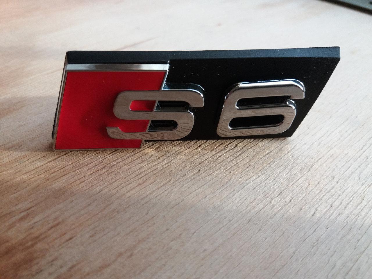Шильдик напис S6 на решітку радіатора