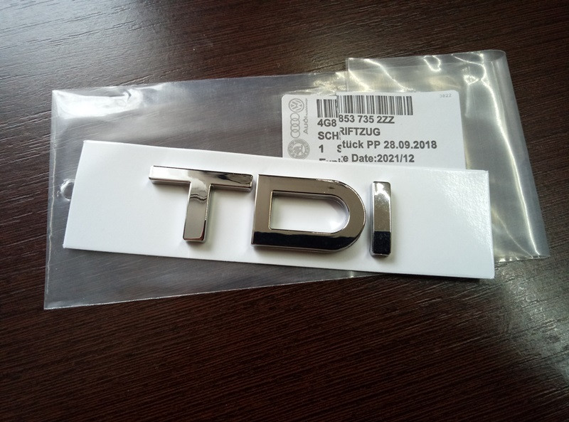 Шильдик напис TDI на кришку багажника Audi