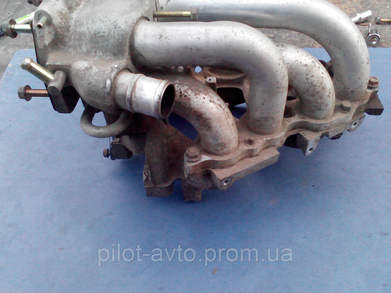 Впускной коллектор Z552-13-100A Mazda 323 BA 1.5 z5 - фото 4 - id-p164305220