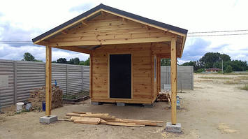 Будиночок дерев'яний з бруса 4,6х7,7 м.