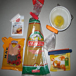 Затискачі для пакетів