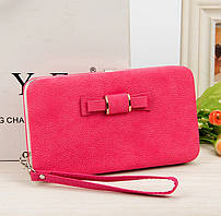 Рожевий жіночий гаманець клатч з бантиком