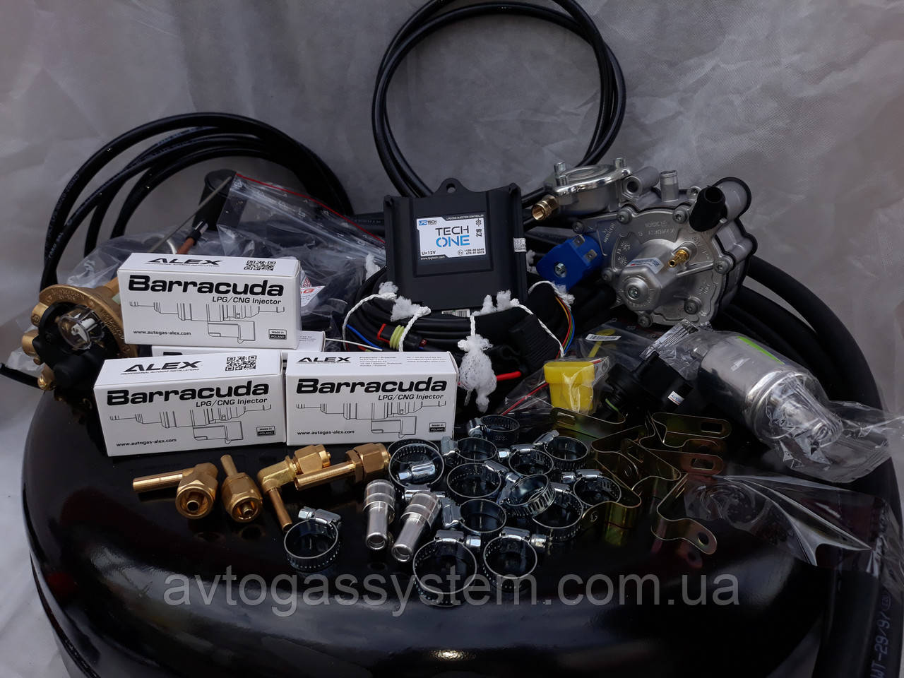 Комплект ГБО 4 покоління Lpg Tech One/Tomasetto/форсунки Barracuda з балоном під запаску, фото 1