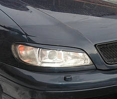 Вії для фар Opel Omega 1996-1999