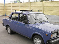 Багажник на дах ВАЗ 2101 ― 2107 на водостоки , поперечки гладкі.