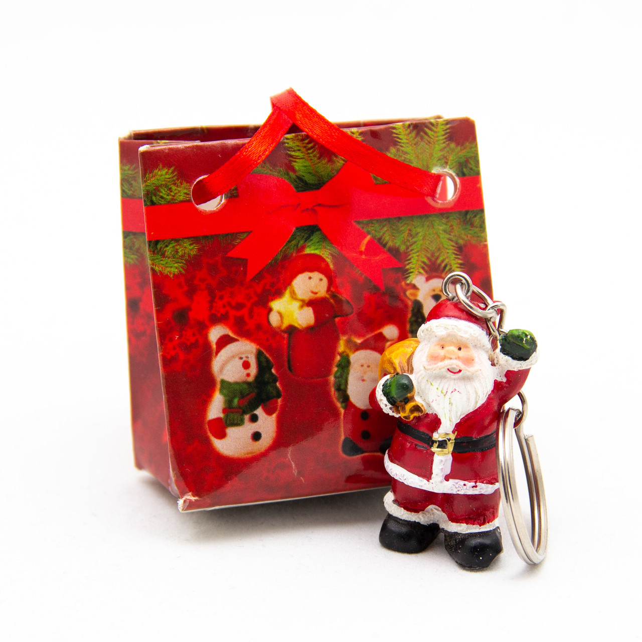 Декоративна новорічна фігурка-брелок Дід Мороз у паперовому пакеті, 5 см, червоний, полістоун, папір (022304-4)