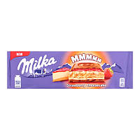 Шоколад Milka Зі смаком чізкейка, полуничною начинкою та печивом.