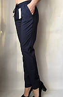 Літні жіночі штани однотонні на гумці темно-сині Прямі літні жіночі штани великих розмірів