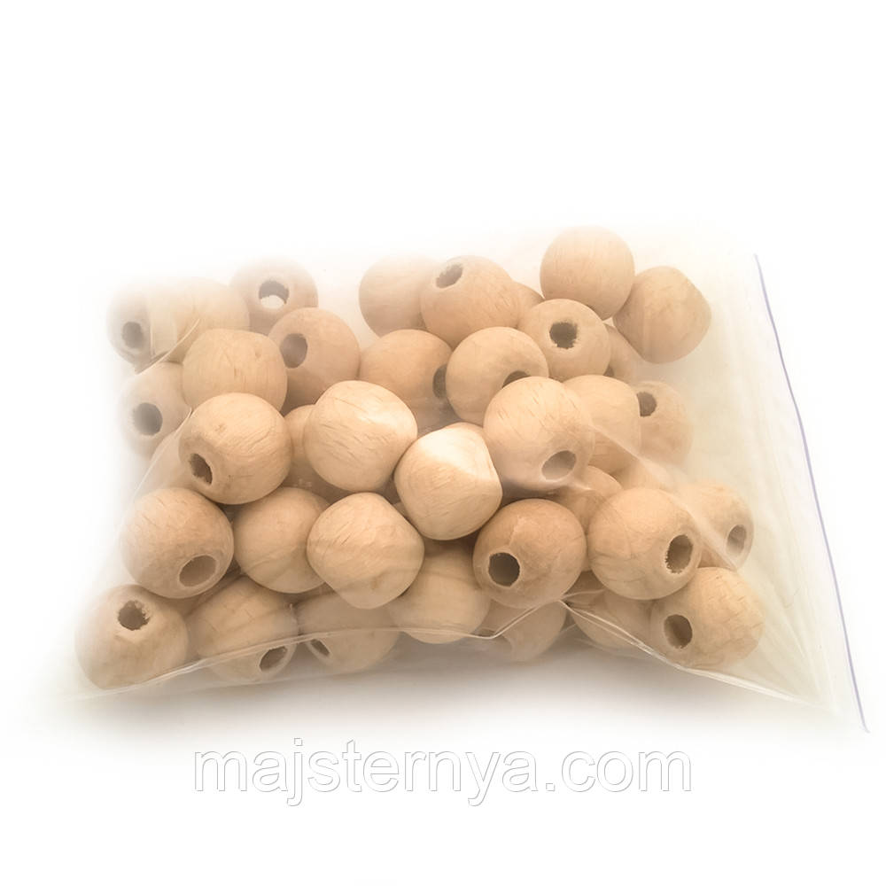 Дерев'яні намистини 20мм, діаметр дірки 7мм (50шт в упаковці) нефарбовані, натуральні з світлого бука