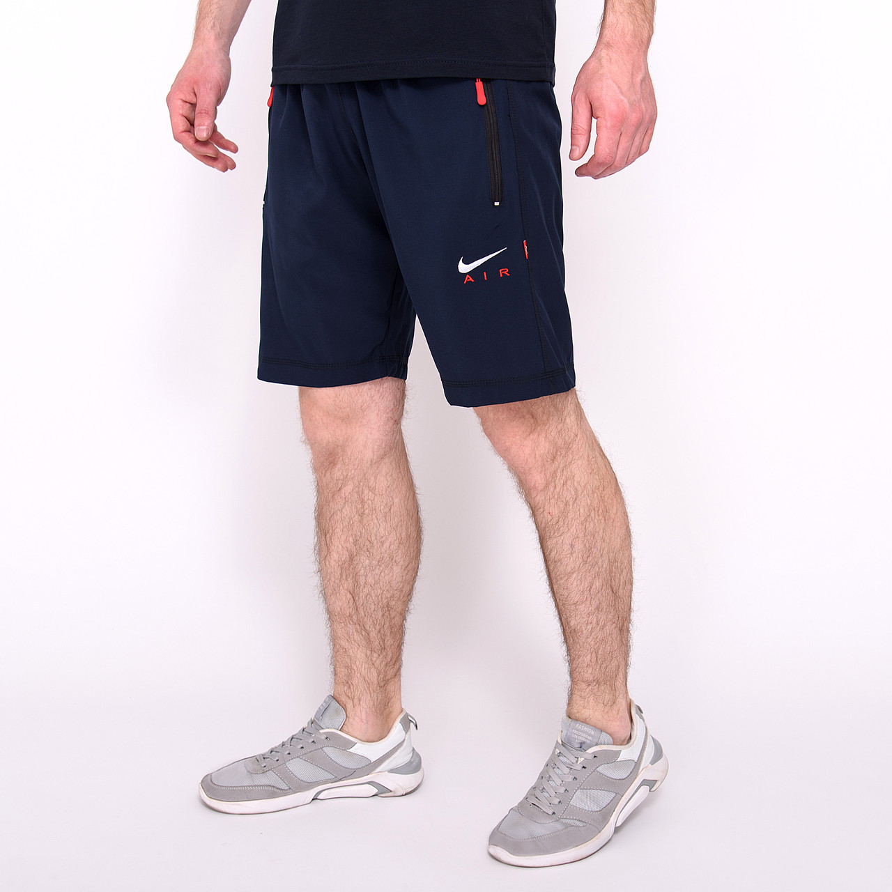 Чоловічі спортивні шорти Nike, синього кольору (плащівка).