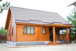 Дерев'яний будинок з термобруса з верандою 74,1 м2. від виробника Thermo Wooden House 003