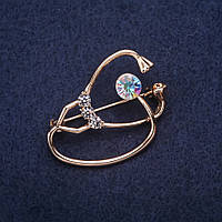 Брошка Стетоскоп стрази колір білий хамелеон 37х26мм золотистий метал купити біжутерію дешево оптом в інтернеті