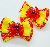 Школьные бантики Банты для девочки жёлтые с красным стразовым кабашоном