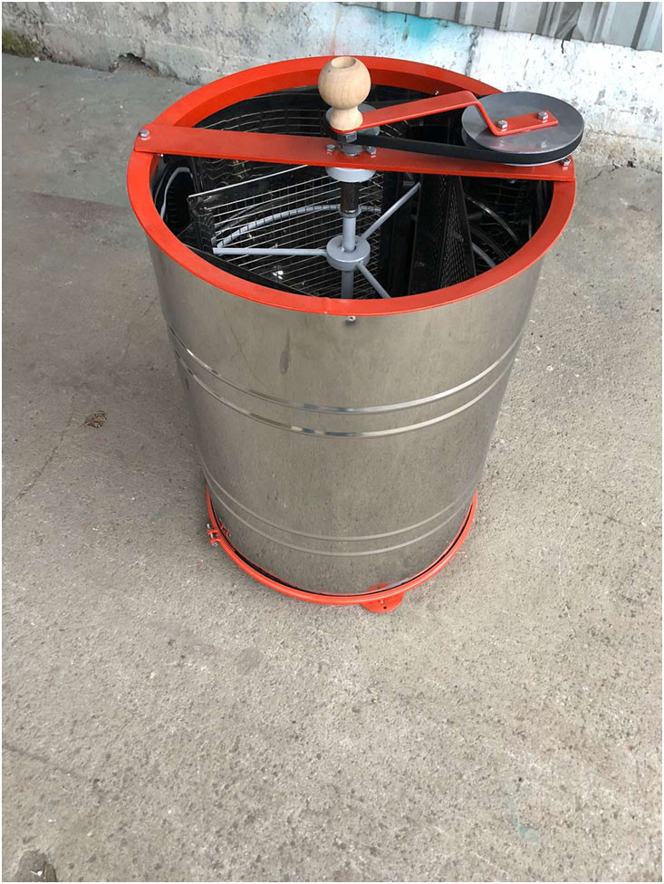 Медогонка на 4 рамки (поворотна, неіржавка, ремінна)