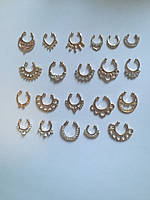 Фейк септум позолота. Сережки в ніс обманка. Імітація пірсингу септуму