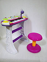 Синтезатор с микрофоном и стульчиком пианино 7235 розовый