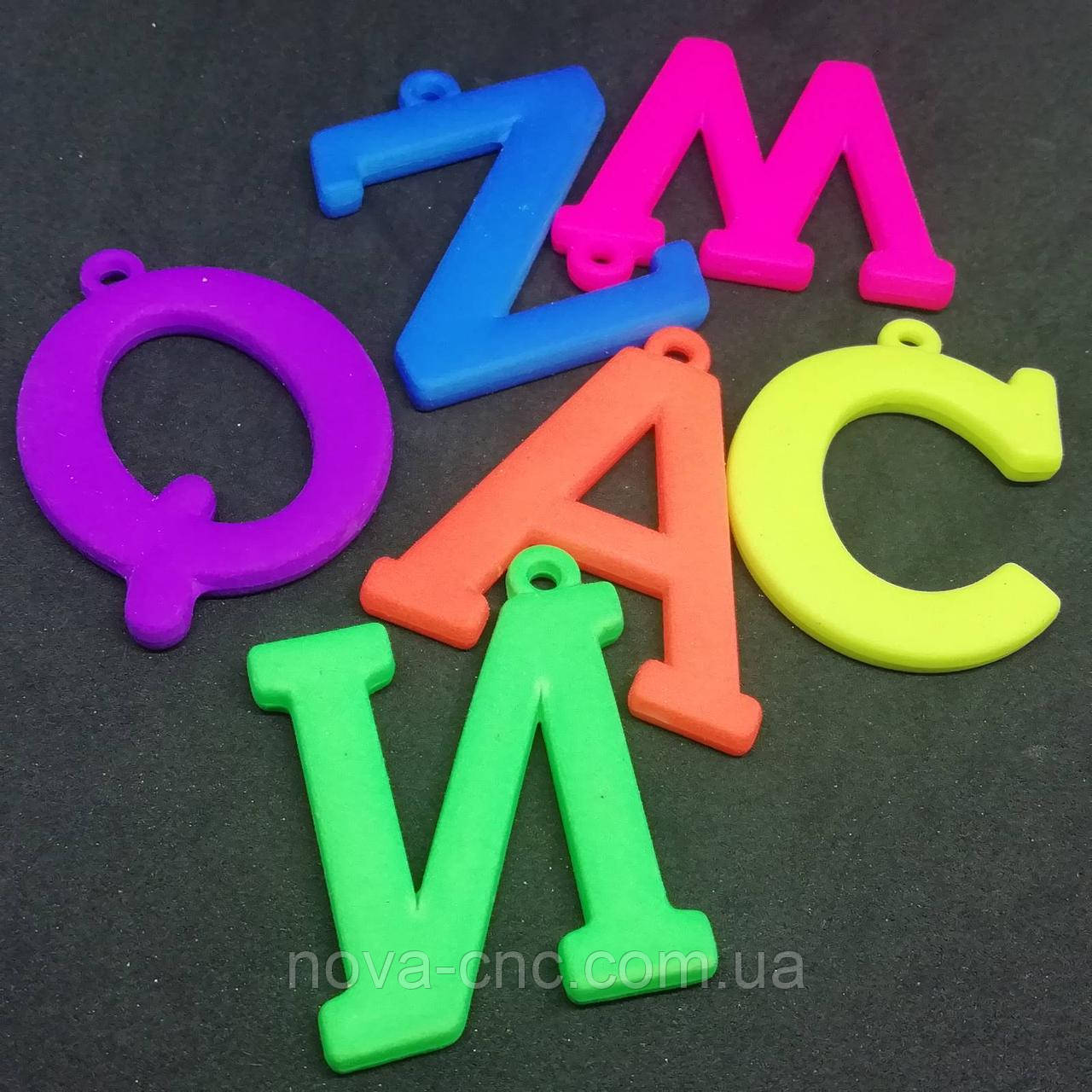 Підвіски пластик "Алфавіт" мікс 40 х 30 мм 500 грамів