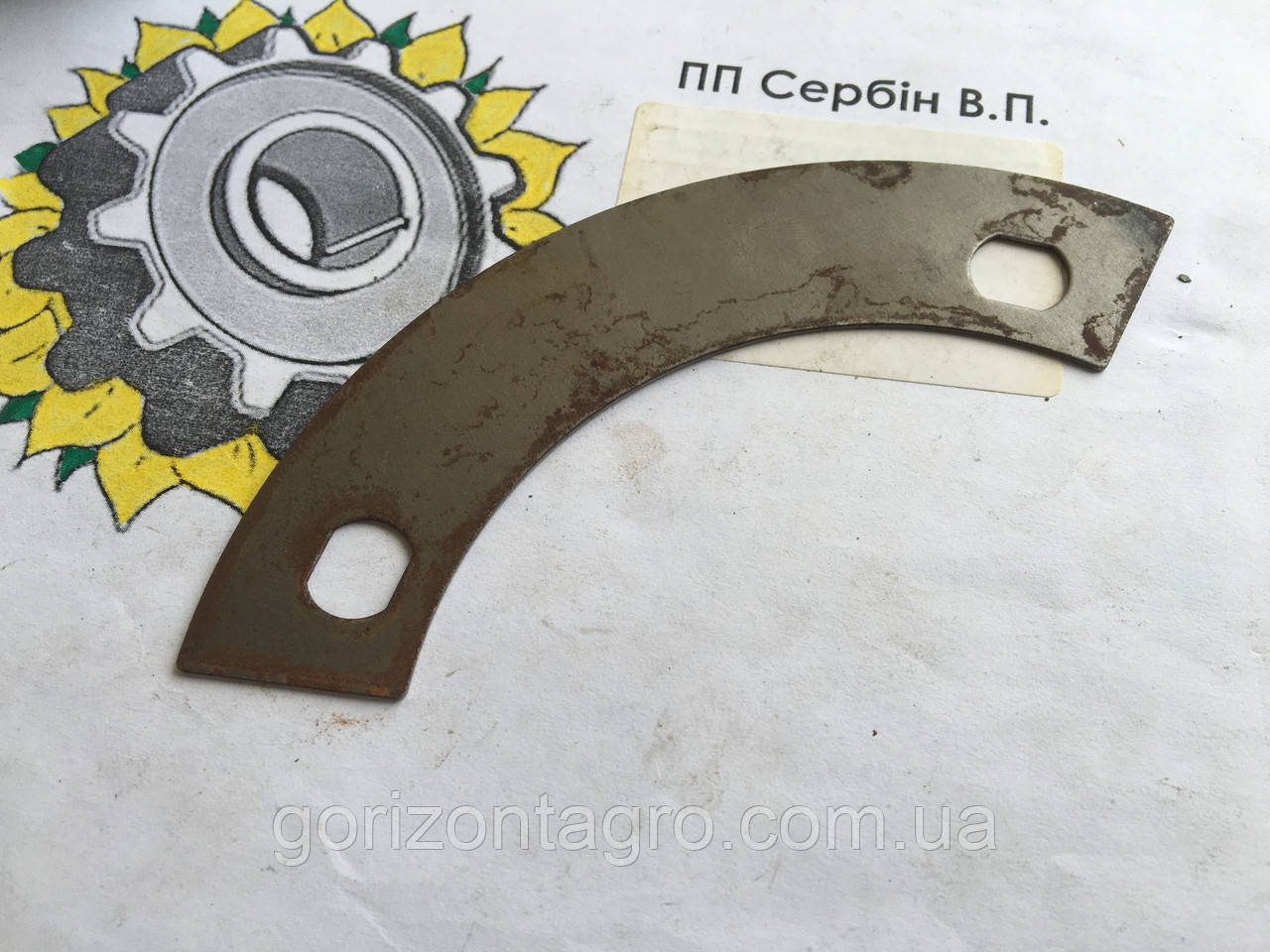 Підкладка, що відгинається, на польську роторну косарку
