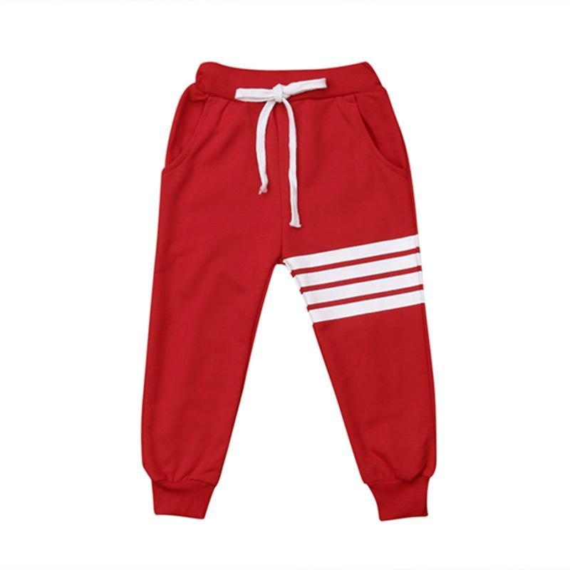 Спортивні дитячі штани червоного кольору з білими смугами Point ONE
