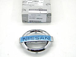 Емблема Nissan на решітку радіатора на Ніссан Примастар з 2006 р. в. NISSAN (Оригінал) 62392-00QAB