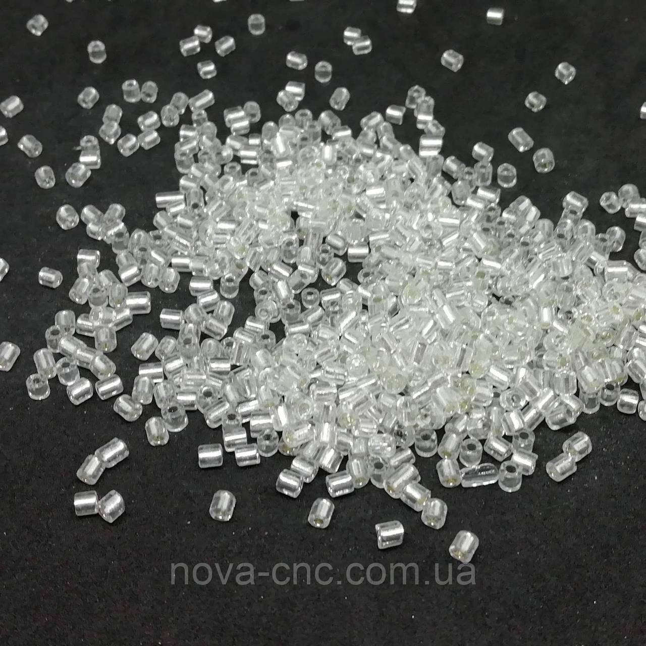 Бісер рубка кераміка 3 мм прозорий зі срібною серединкою 450 грам
