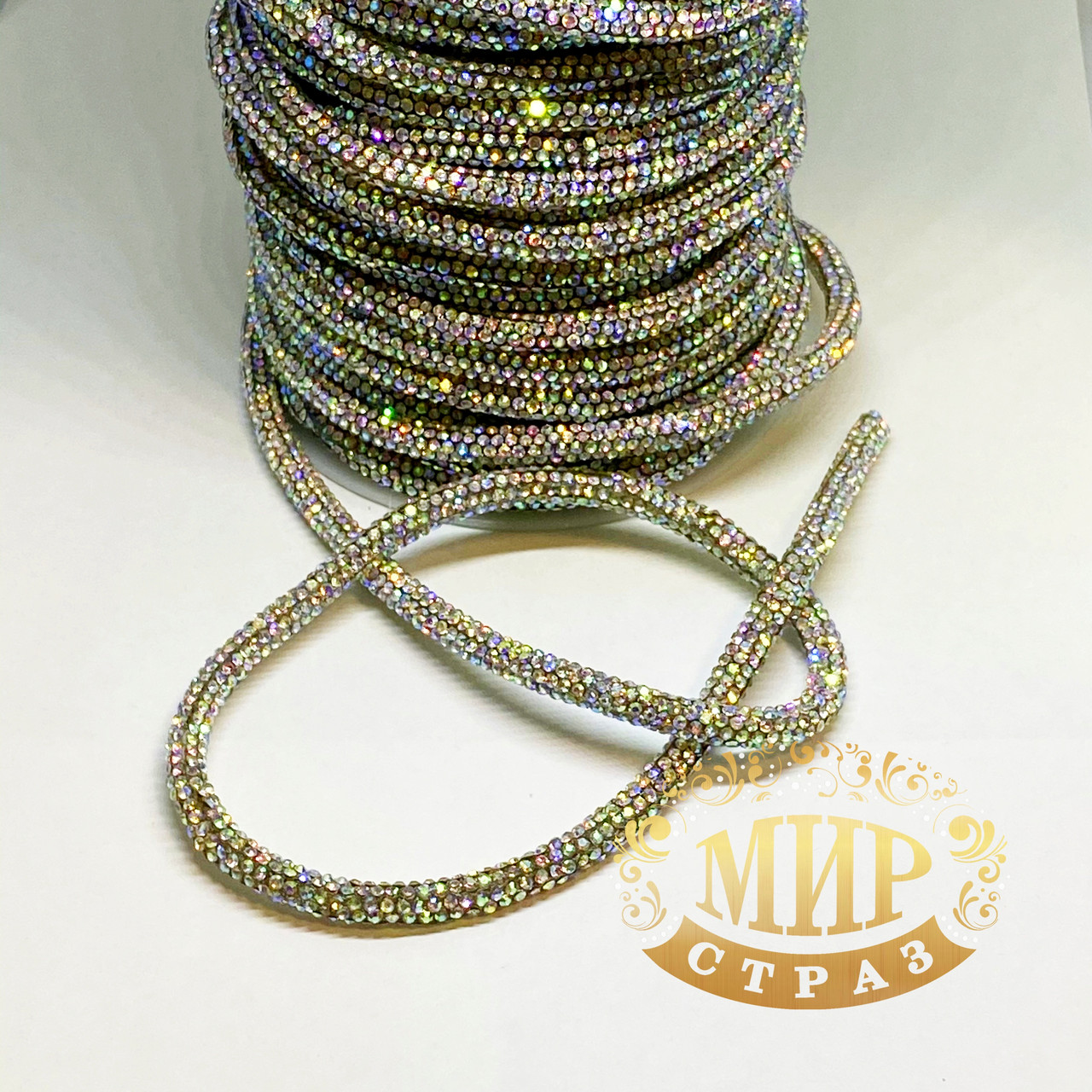 Стразовий шнур жорсткий , колір Crystal AB  (діаметр 5-7 мм), 1 м