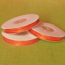 Стрічки атласу, люриксу, капрон 1 см жовтогарячий 23 м