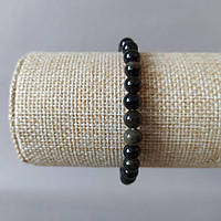 Браслет з натурального каменю золотистий Обсидіан на резинці гладка кулька d-6мм L- 18см купити біжутерію дешево оптом в інтернеті