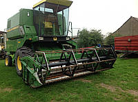 Комбайн John Deere 975