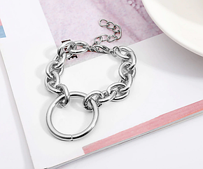 Жіночий браслет широкий срібний з великим кільцем посередині