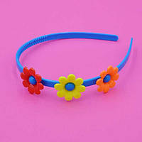 Обруч для волосся кольоровий пластик із ромашками