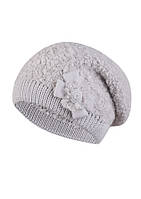 Красива букльована жіноча шапка від Kamea Mya.